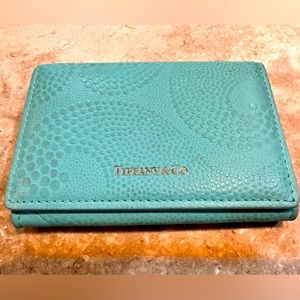 Tiffany & Co pebbled leather card case. 4 x 2.5 x 0.5 inches.